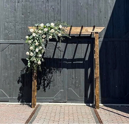 Floral decoration on ceremony chairs